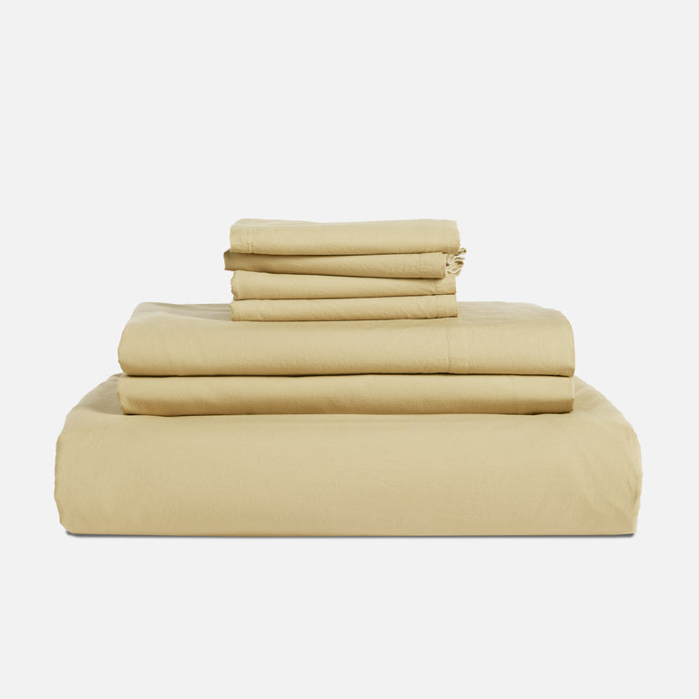 https://www.brooklinen.com/cdn/shop/files/BKL_23-06_Bedding_Organic_Moss_HCB_1x_WOgrey_768x.progressive.jpg?v=1690469062