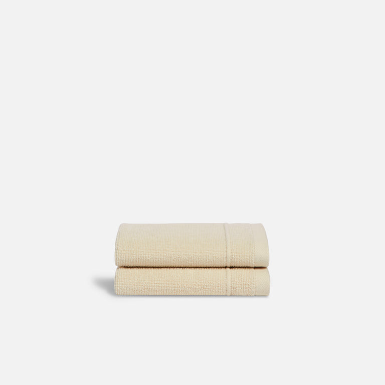 https://www.brooklinen.com/cdn/shop/products/BKL_22-11_Bath_Classic_Washcloth_Vanilla_1x_WOgrey_768x.progressive.jpg?v=1695313763